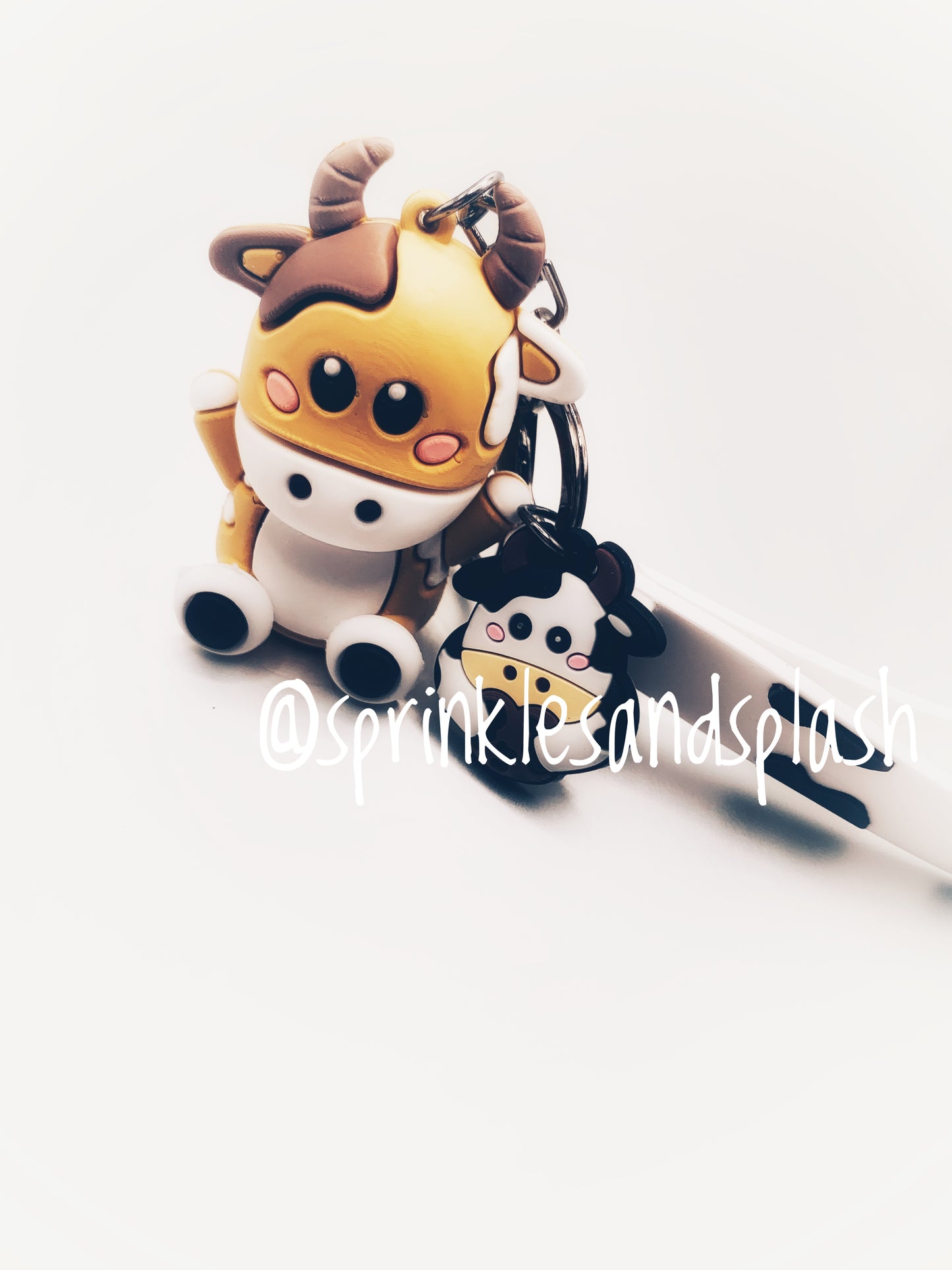 Brown/White Cow Charm Keychain